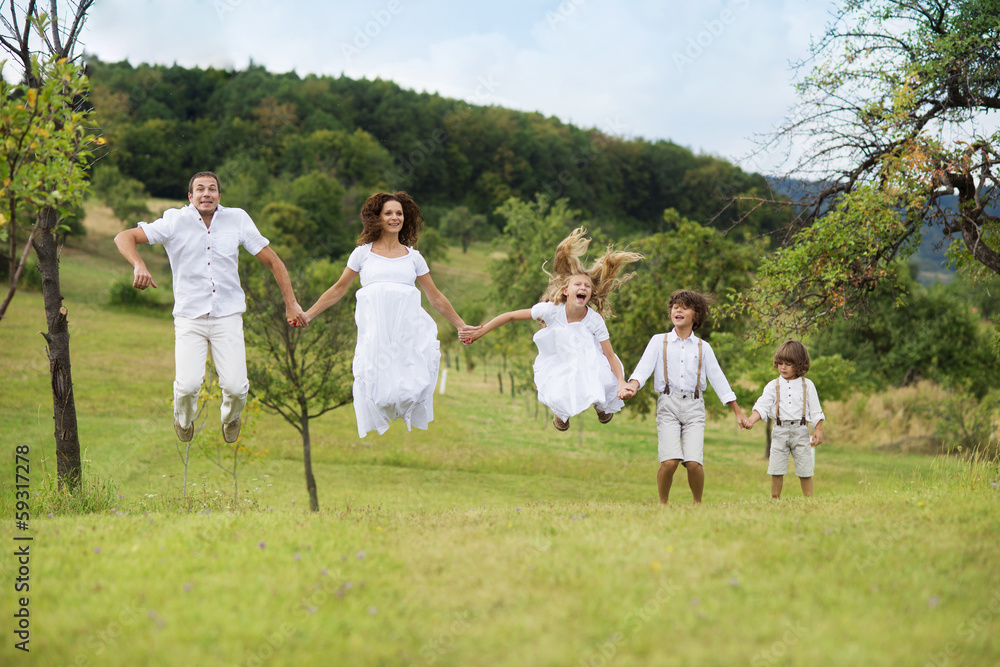 Fototapeta premium Big family is relaxing in green nature