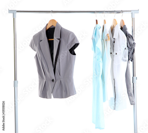 Office clothes on hangers, isolated on white © Africa Studio
