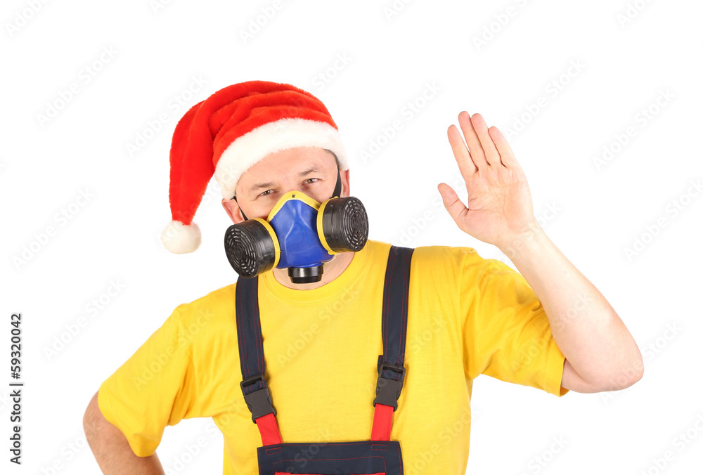 Worker in gas mask show hand. Worker in gas mask show hand.