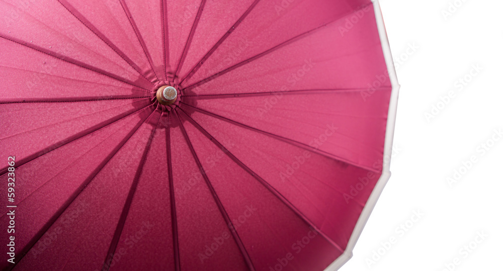 An open umbrella over white background