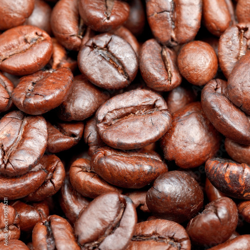 red roasted coffee beans close up
