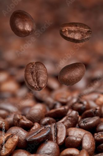 four falling beans and roasted coffee
