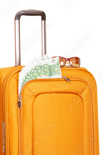 Suitcase with money isolated on white background