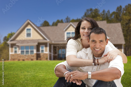 Happy Hispanic Young Couple...
