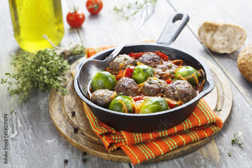 Meatballs with vegetables in tomato sauce