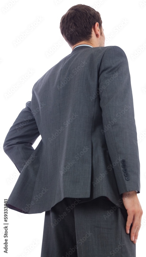 Businessman standing with hand on hip Businessman standing with hand on hip