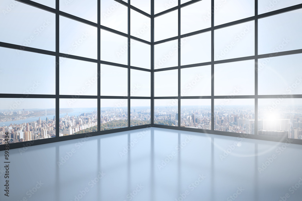 Room with large windows showing city Room with large windows showing city