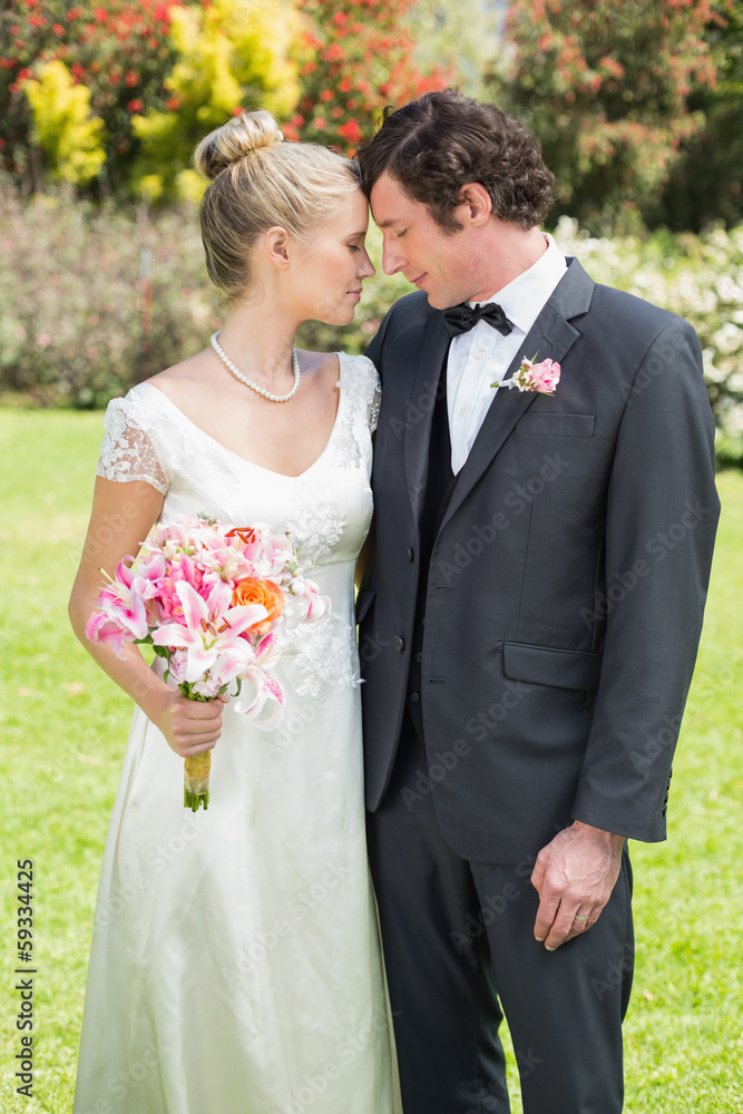 Happy newlyweds looking at each other Happy newlyweds looking at each other