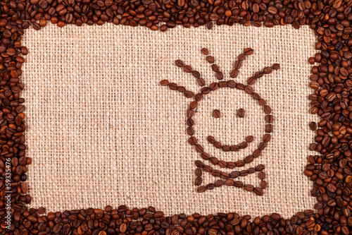 Happy face made of coffee beans