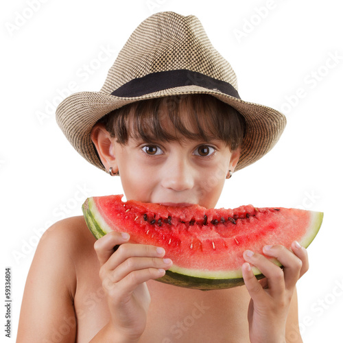 Pretty brown-eyed girl eating ripe watermelon