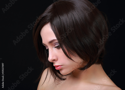 Black hair. Beautiful sexy woman with short hair cut