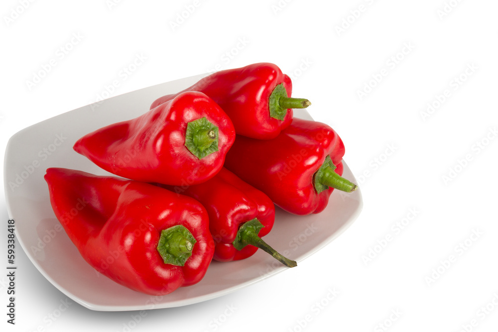 Fresh red peppers isolated on white Fresh red peppers isolated on white