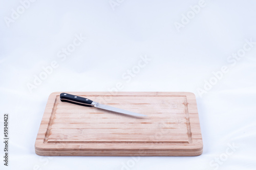 chopping board with a knife front view
