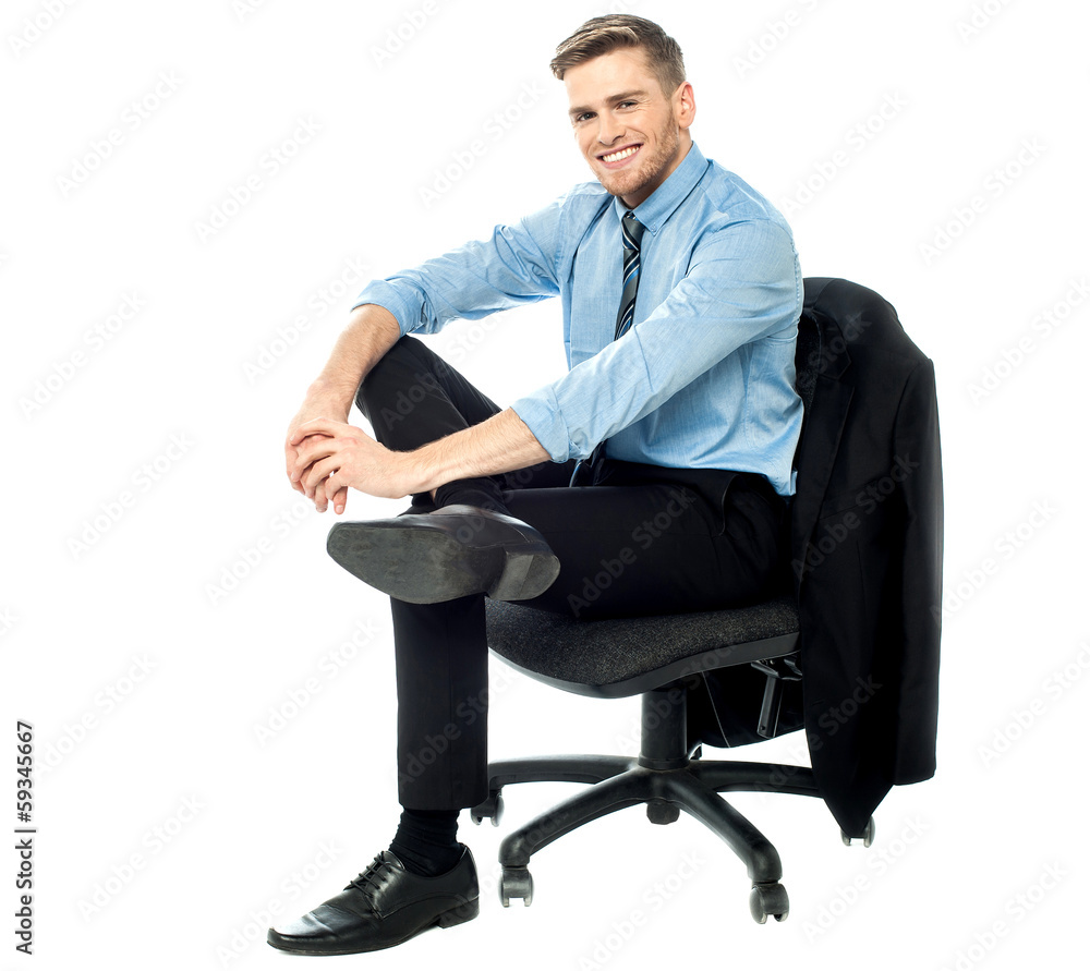 Relaxed businessman posing casually