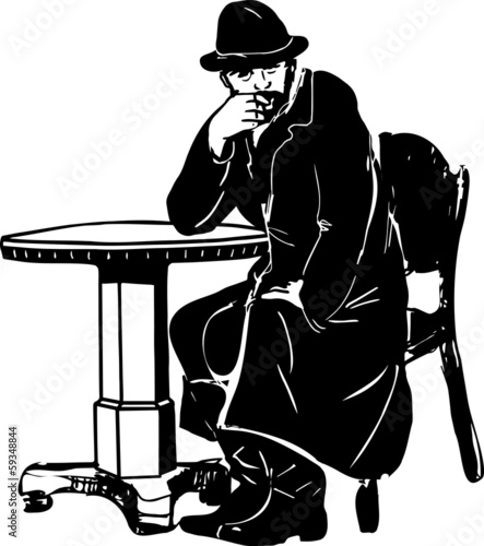 man with a beard at the table