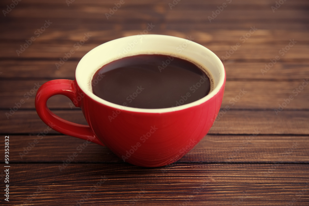 red cup coffee on wood background red cup coffee on wood background