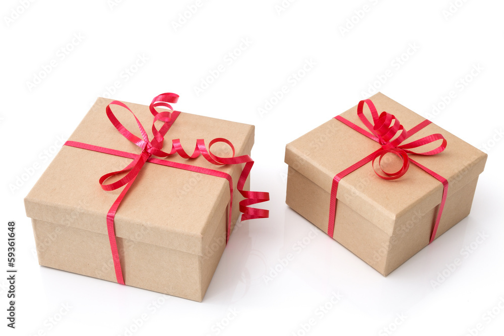 Two gift boxes with red ribbons on white background Two gift boxes with red ribbons on white background