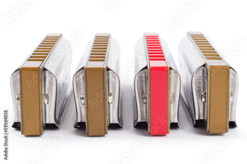 stand out red harp or harmonica (blues harp)