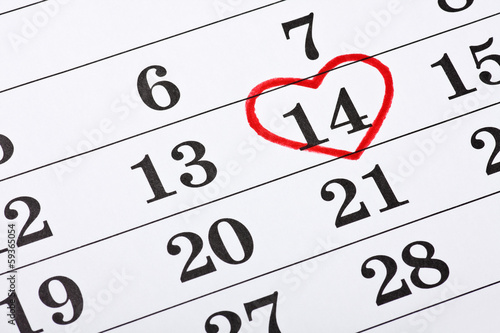 Fotografie February 14 on the calendar, Valentine's Day red heart encircled