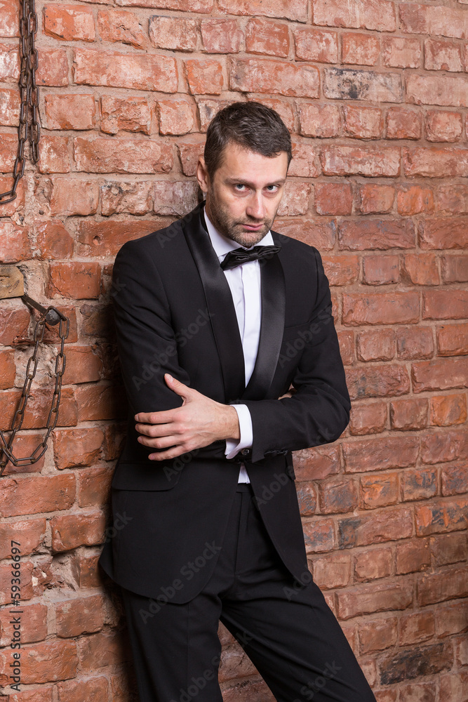 Elegant macho man in a bow tie Elegant macho man in a bow tie