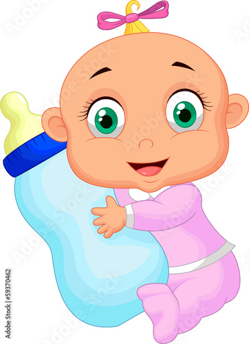 Baby girl holding milk bottle