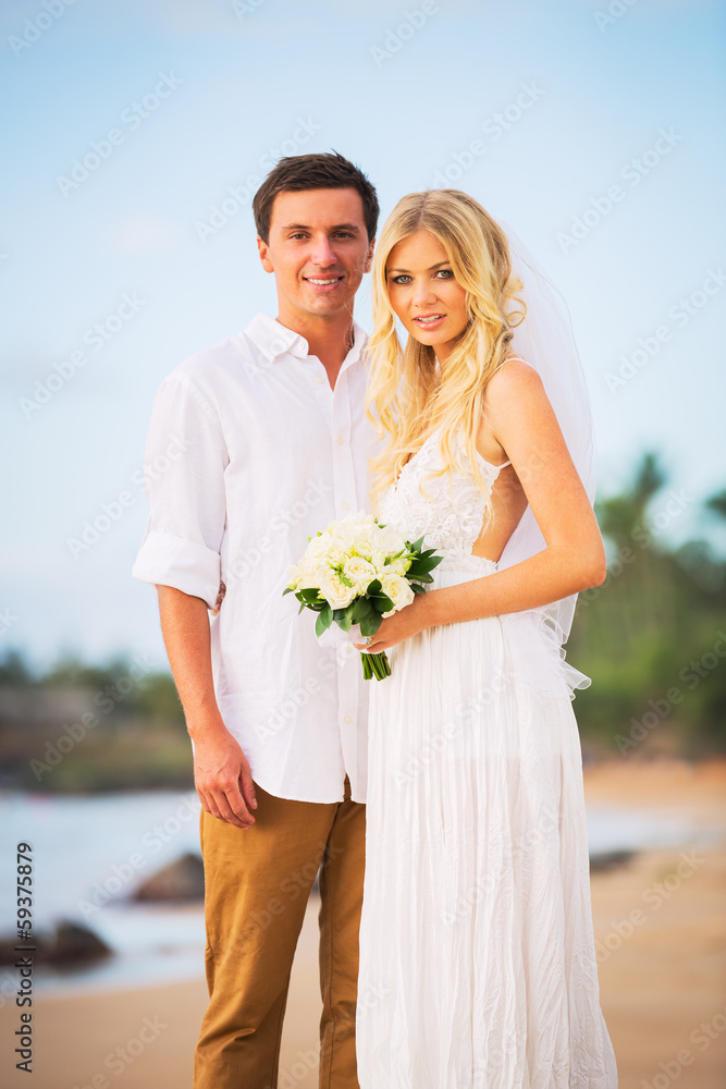 Bride and Groom, Enjoying Amazing Sunset on a Beautiful Tropical