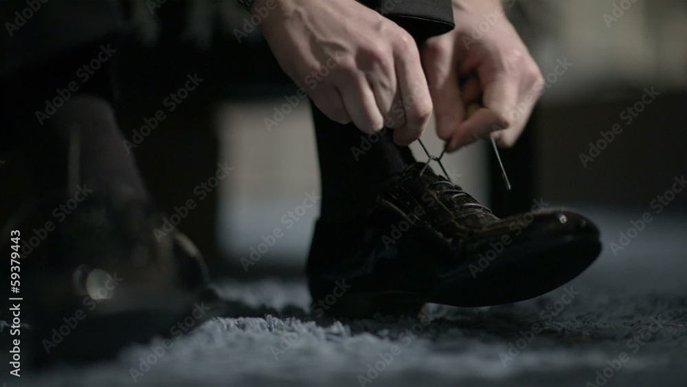 Man tying shoes. Man tying shoes.