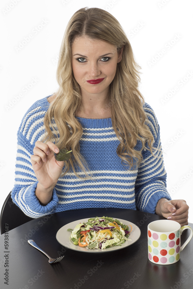 Young Woman Eating Mixed Vegetables Young Woman Eating Mixed Vegetables
