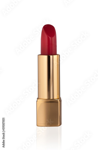 Red lipstick in golden bullet isolated on white background photo