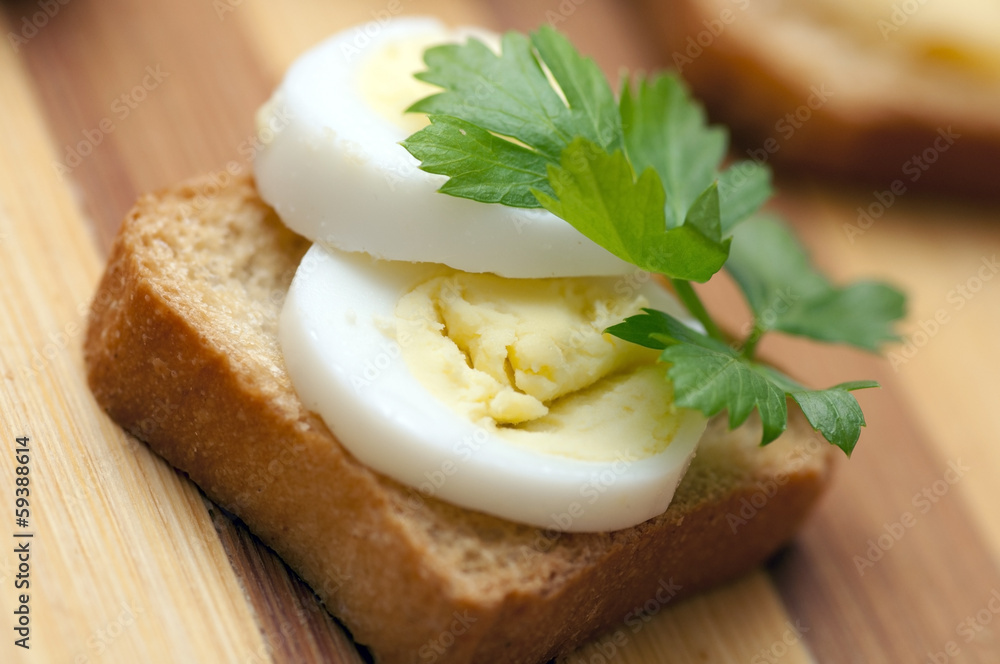 Small snack with quail egg for buffet Small snack with quail egg for buffet