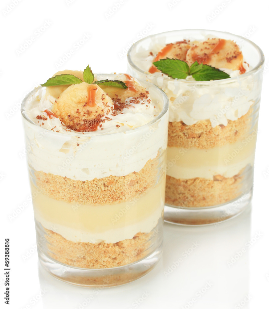 Delicious dessert with banana and caramel isolated on white Delicious dessert with banana and caramel isolated on white