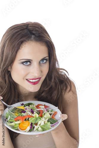 Young Woman Eating Stir Fried Vegetables