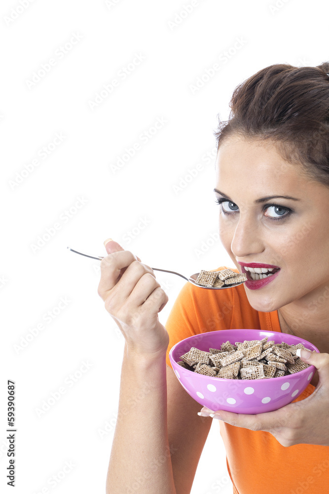 Young Woman Eating Breakfast Cereal Young Woman Eating Breakfast Cereal