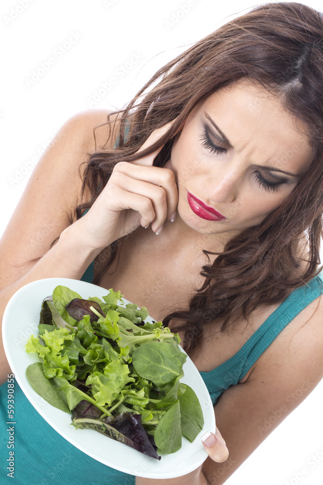 Young Woman Eating Green Leafed Salad Young Woman Eating Green Leafed Salad