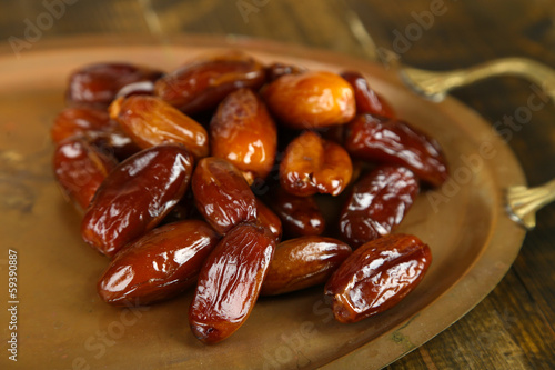 Conceptual photo of Ramadan food:dates palm on tray
