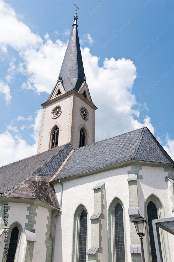 church spire against the cloudy sky Gmünd in Kärnten (Carinthia)
