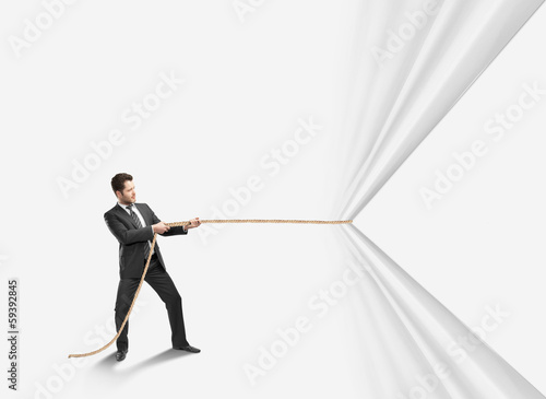 Obraz na płótnie man pulling rope