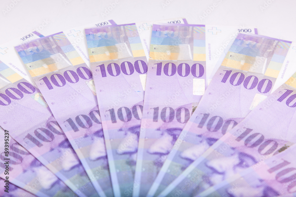 Swiss Francs banknotes spread over the floor - Switzerland curr Swiss Francs banknotes spread over the floor - Switzerland curr