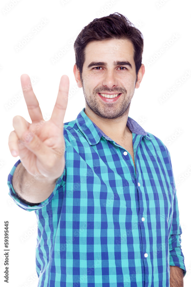 Handsome man giving the victory sign, isolated on white backgrou Handsome man giving the victory sign, isolated on white backgrou