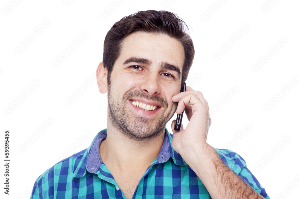 Handsome latin man talking on cell phone, isolated on a white ba Handsome latin man talking on cell phone, isolated on a white ba