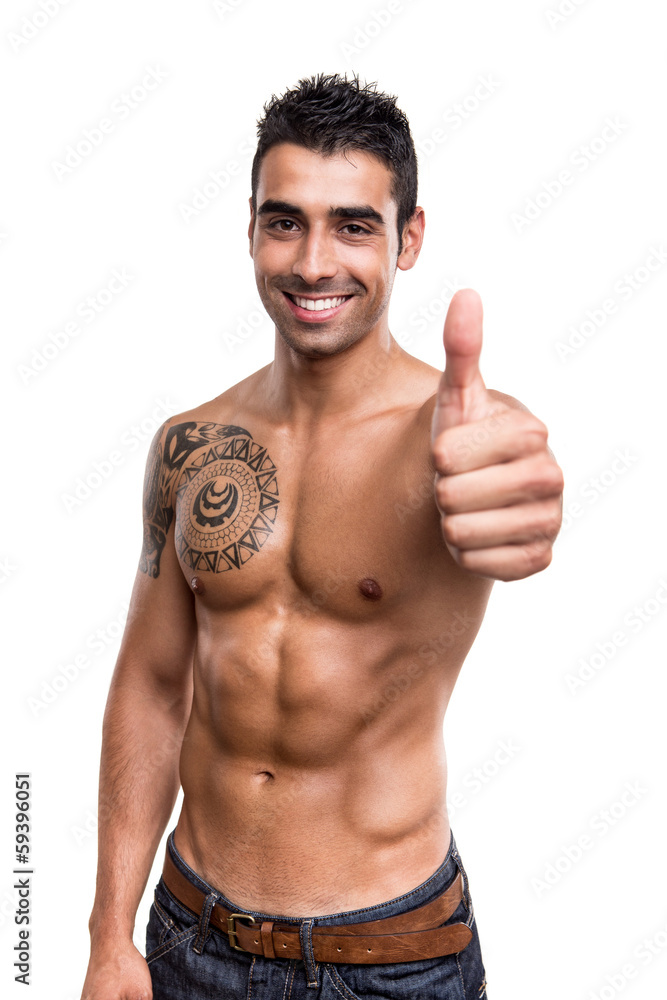 Fit man showing thumbs up Fit man showing thumbs up
