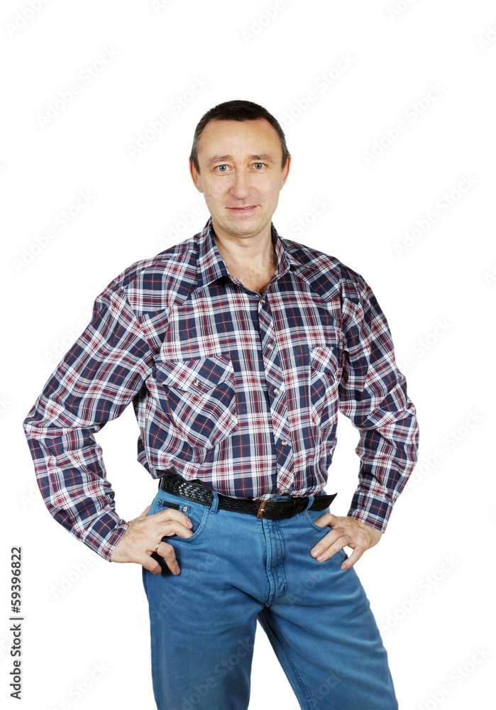 Fototapeta premium Adult man dressed in jeans and a plaid shirt