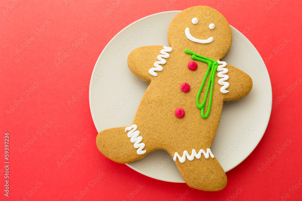 Gingerbread on red background