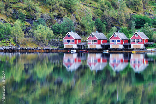Fototapeta Scenic View of lake and fishing huts in Flam, Norway