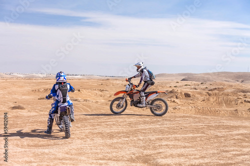 racing motorcycles on the desert