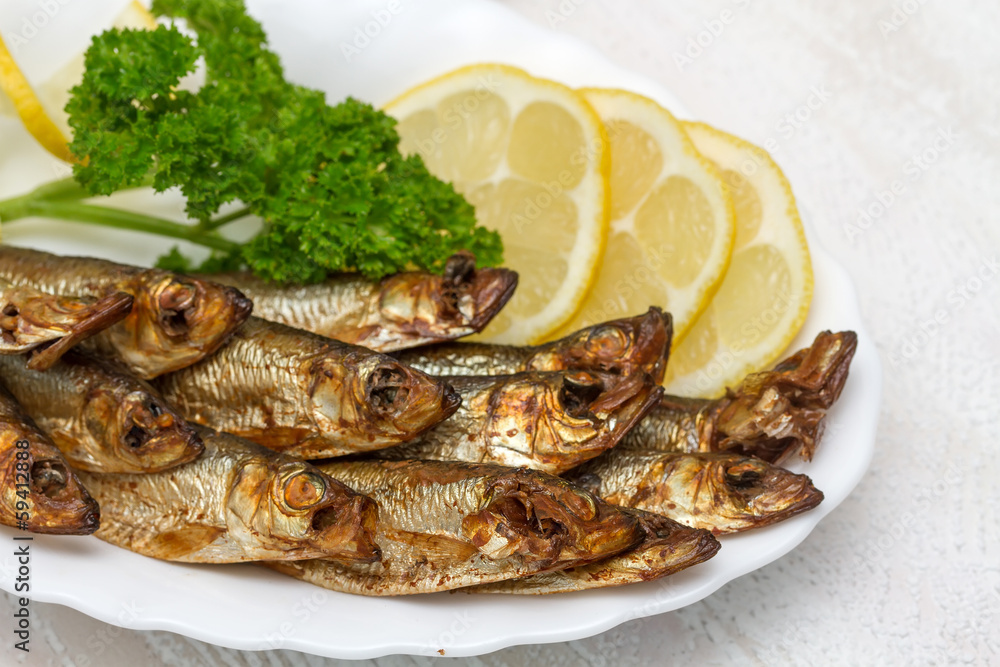 Smoked sardines with lemon and herbs. Smoked sardines with lemon and herbs.