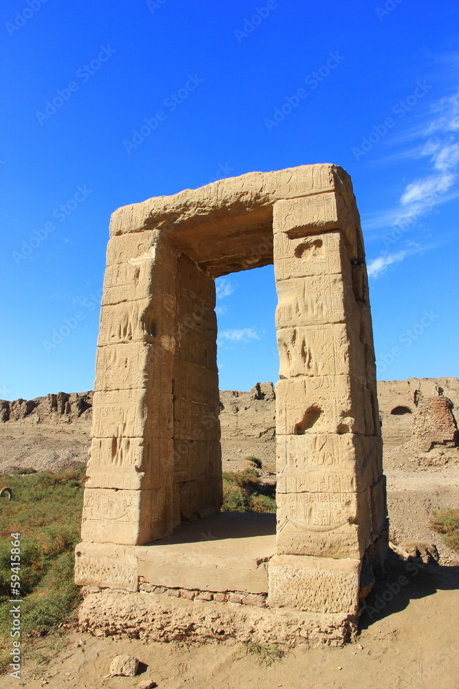 ancient gates with Egyptian symbols