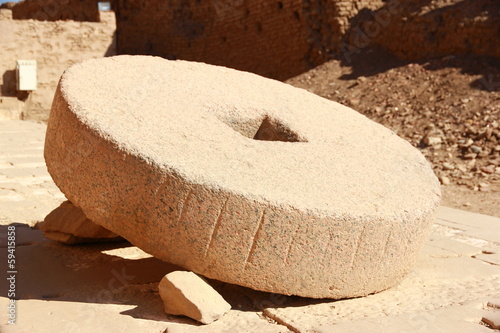 ancient wheel at Karnak temple photo