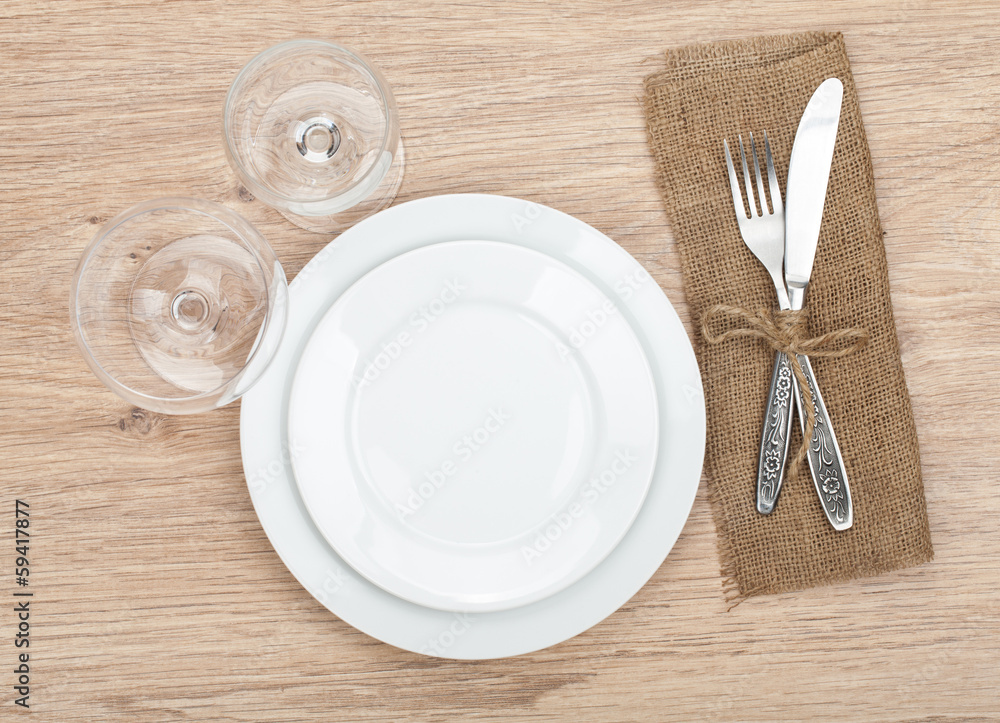 Empty plate, wine glasses and silverware set Empty plate, wine glasses and silverware set