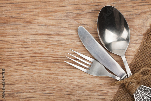 Silverware or flatware set of fork, spoon and knife